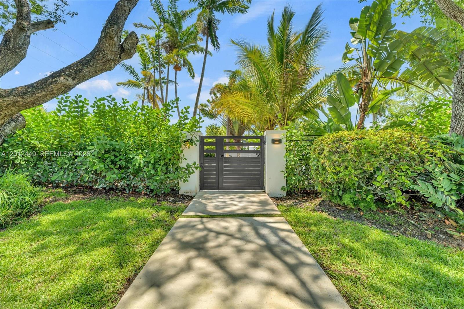 6200 Southwest 118th Street Pinecrest, FL 33156 - Photo 5 of 69 a view of yard with plants