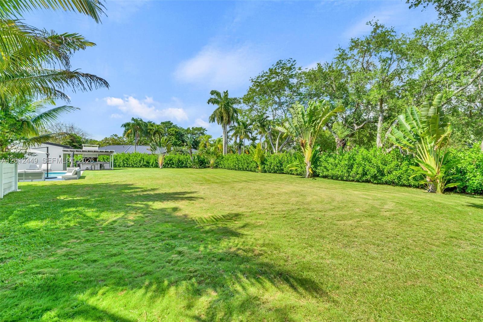6200 Southwest 118th Street Pinecrest, FL 33156 - Photo 56 of 69 a view of a garden