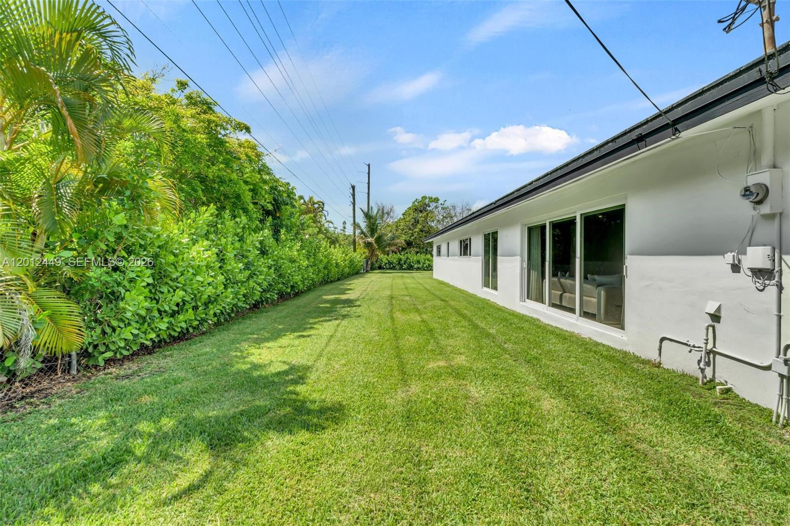 6200 Southwest 118th Street Pinecrest, FL 33156 - Photo 57 of 69 a view of backyard with a garden and plants
