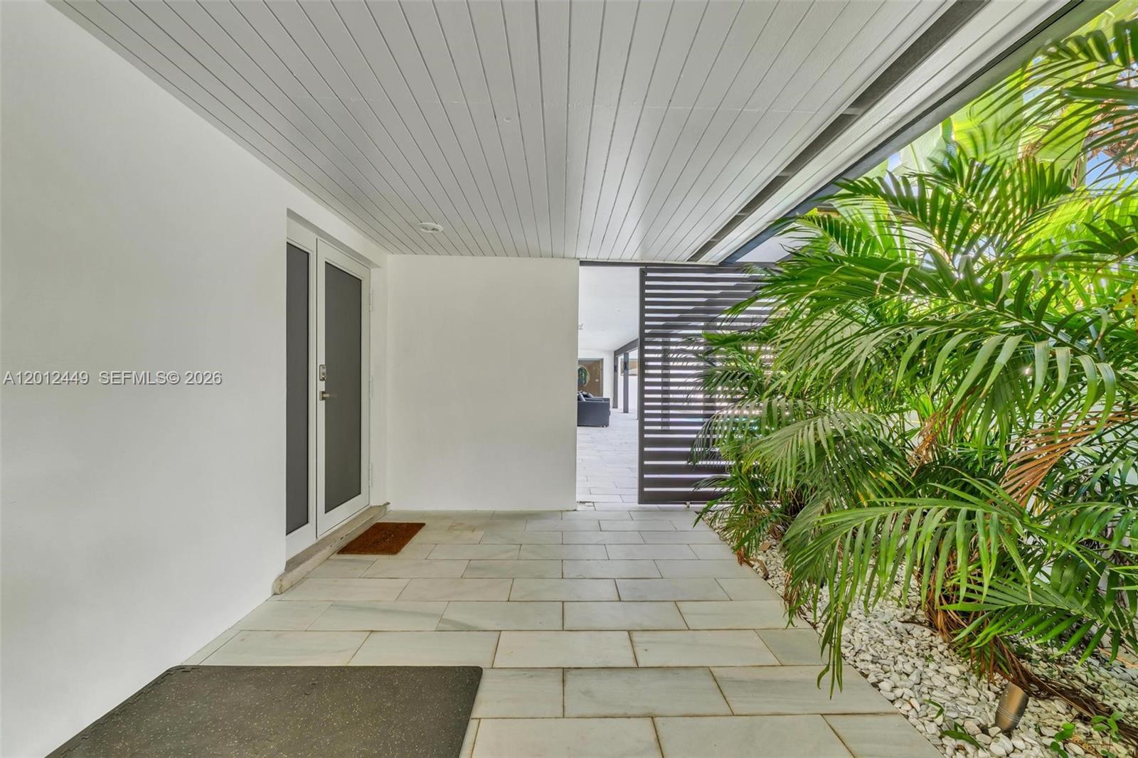 6200 Southwest 118th Street Pinecrest, FL 33156 - Photo 10 of 69 a view of an entrance of the house