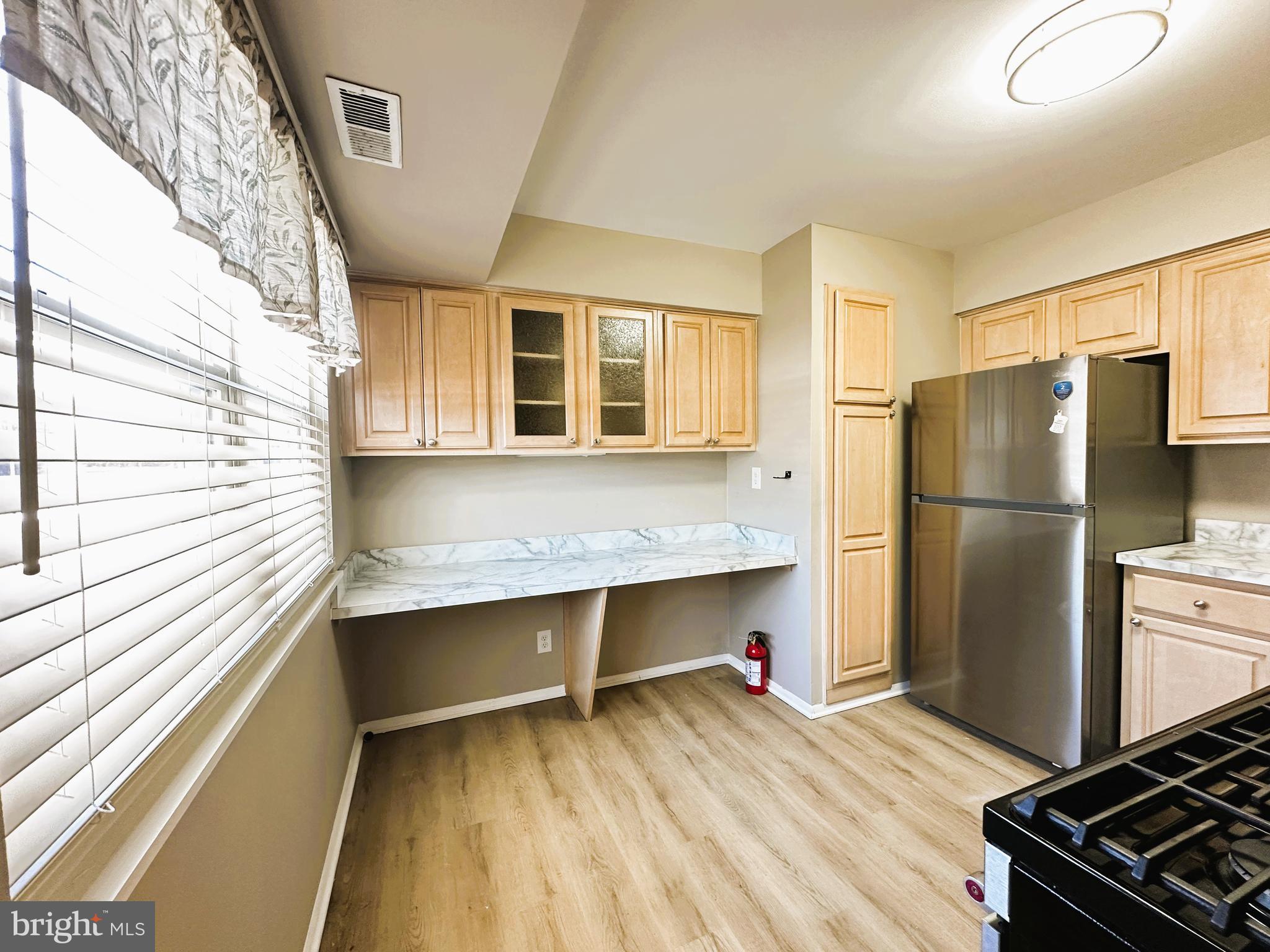 42 D Michael Road Hammonton, NJ 08037 - Photo 2 of 15 a kitchen with stainless steel appliances granite countertop a refrigerator and a stove