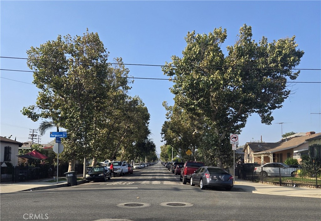 1538 Simmons Avenue Los Angeles, CA 90022 - Photo 11 of 11 a city street lined with buildings and cars
