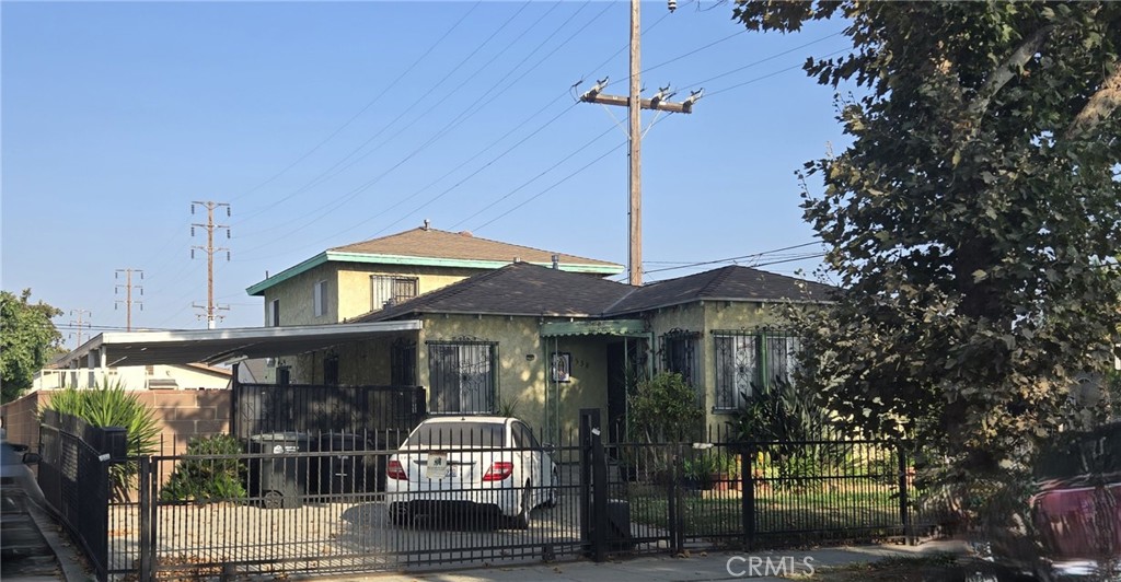 1538 Simmons Avenue Los Angeles, CA 90022 - Photo 2 of 11 a front view of a house with balcony