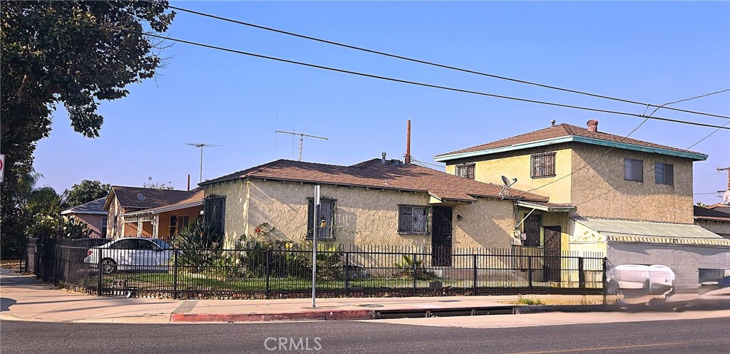 1538 Simmons Avenue Los Angeles, CA 90022 - Photo 3 of 11 a front view of a house with a porch