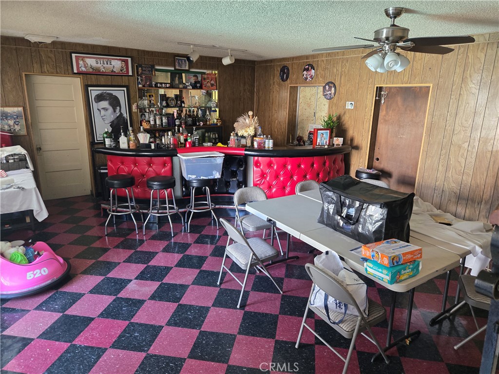 1538 Simmons Avenue Los Angeles, CA 90022 - Photo 8 of 11 a outdoor dining space with furniture and rug