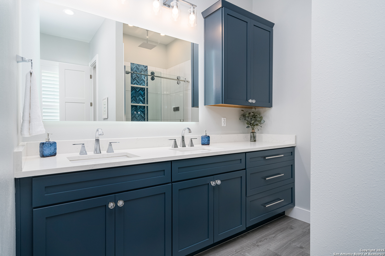 107 Windjammer Road Rockport, TX 78382 - Photo 12 of 52 a bathroom with a sink and a mirror