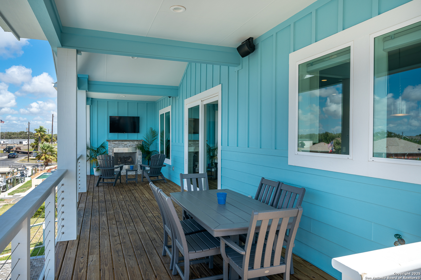 107 Windjammer Road Rockport, TX 78382 - Photo 15 of 52 a view of a dining room with furniture window and wooden floor