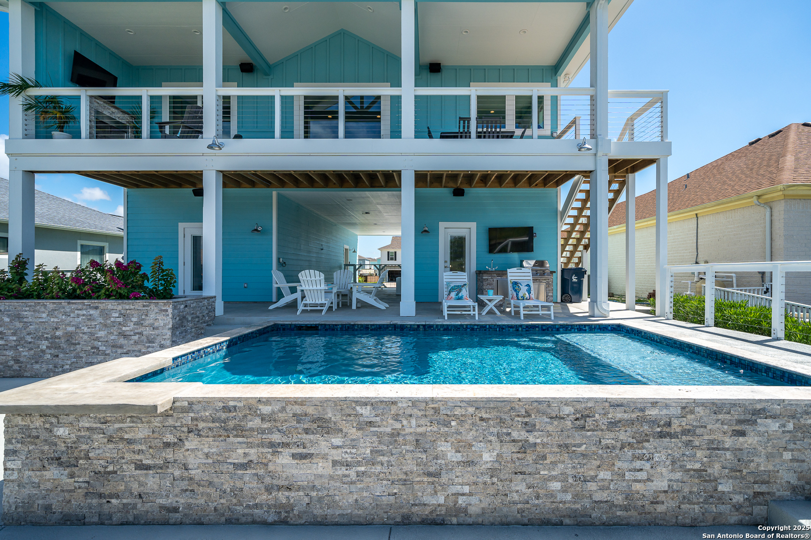 107 Windjammer Road Rockport, TX 78382 - Photo 19 of 52 a view of a building with a fountain