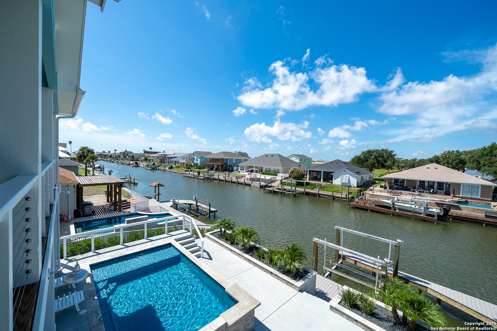 107 Windjammer Road Rockport, TX 78382 - Photo 20 of 52 a view of a lake with a house