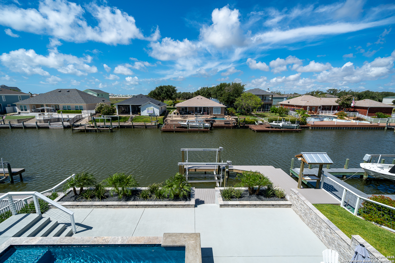 107 Windjammer Road Rockport, TX 78382 - Photo 30 of 52 a view of a lake with houses