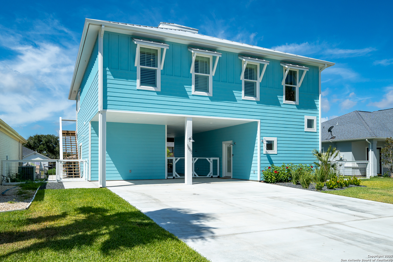 107 Windjammer Road Rockport, TX 78382 - Photo 34 of 52 a front view of a house with a yard