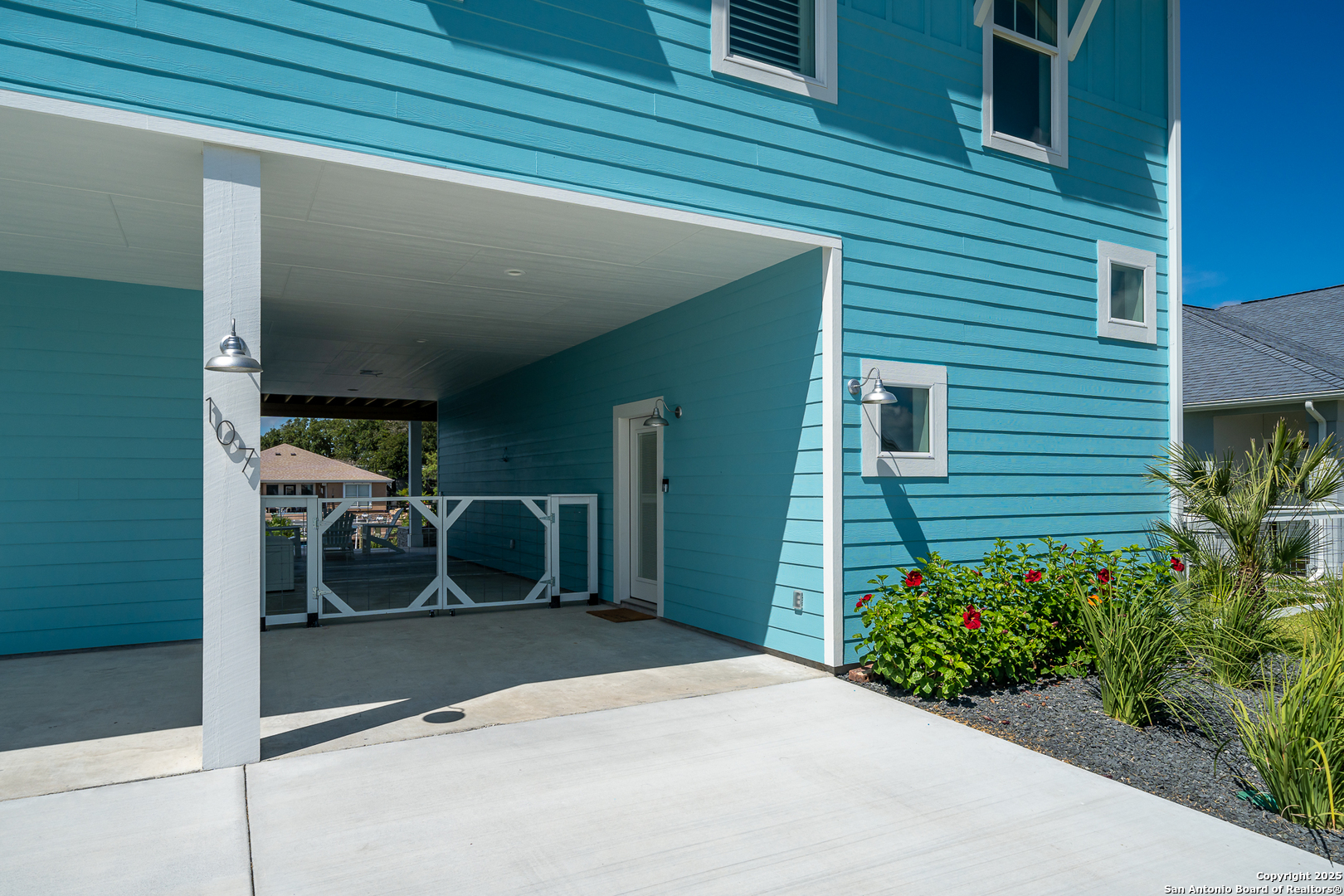 107 Windjammer Road Rockport, TX 78382 - Photo 35 of 52 a view of a porch with seating space