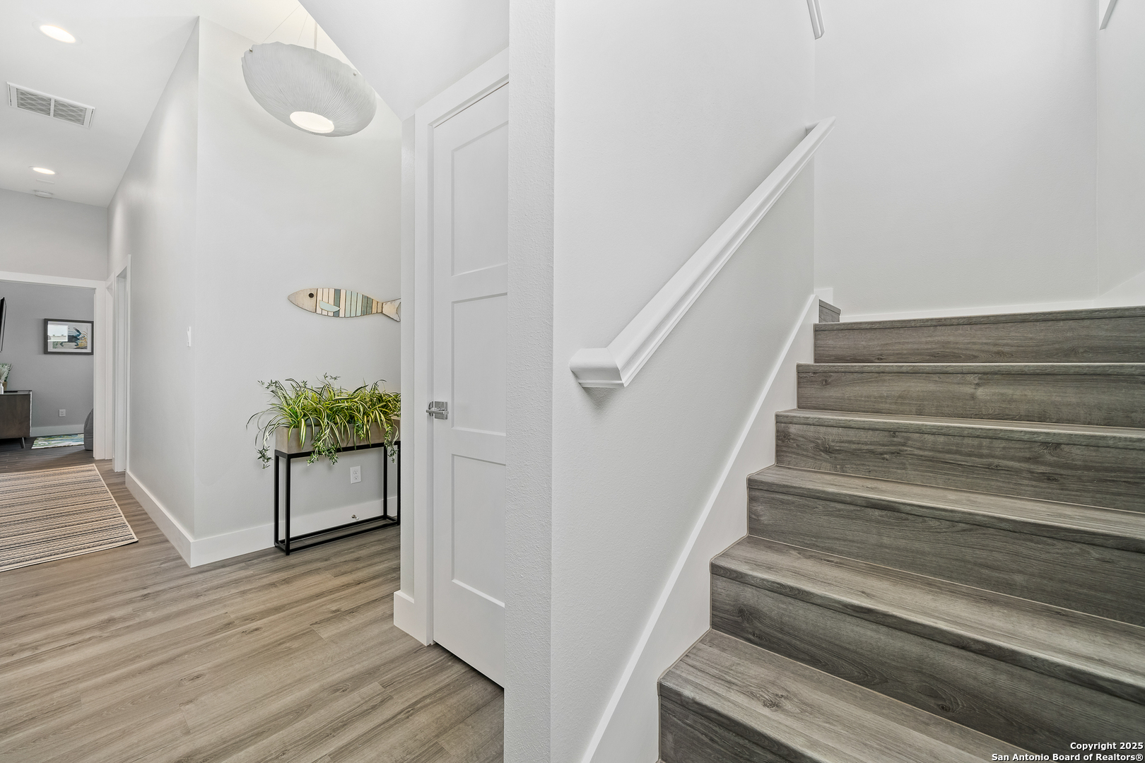 107 Windjammer Road Rockport, TX 78382 - Photo 37 of 52 a view of entryway and hall with wooden floor