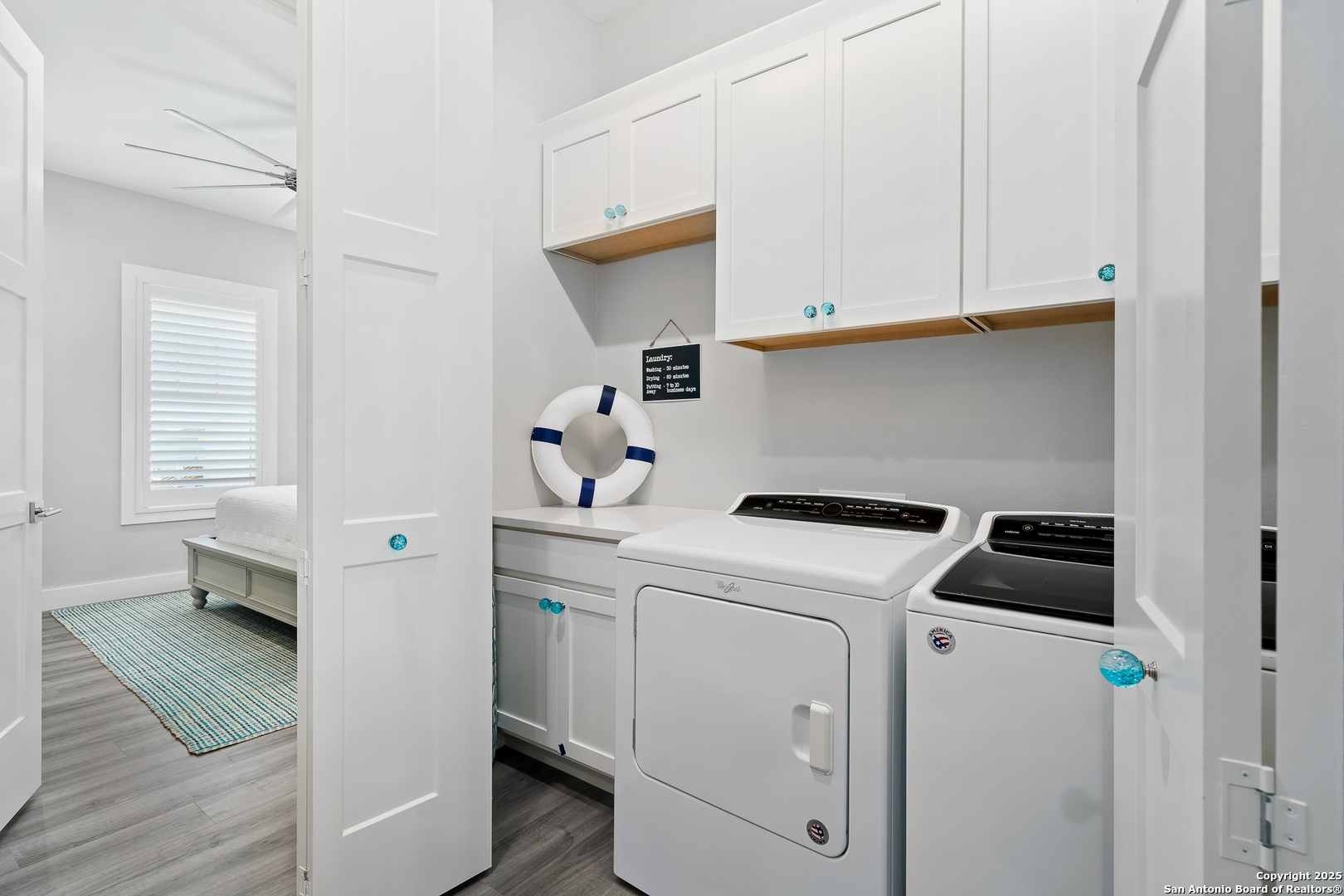 107 Windjammer Road Rockport, TX 78382 - Photo 43 of 52 a utility room with dryer and washer