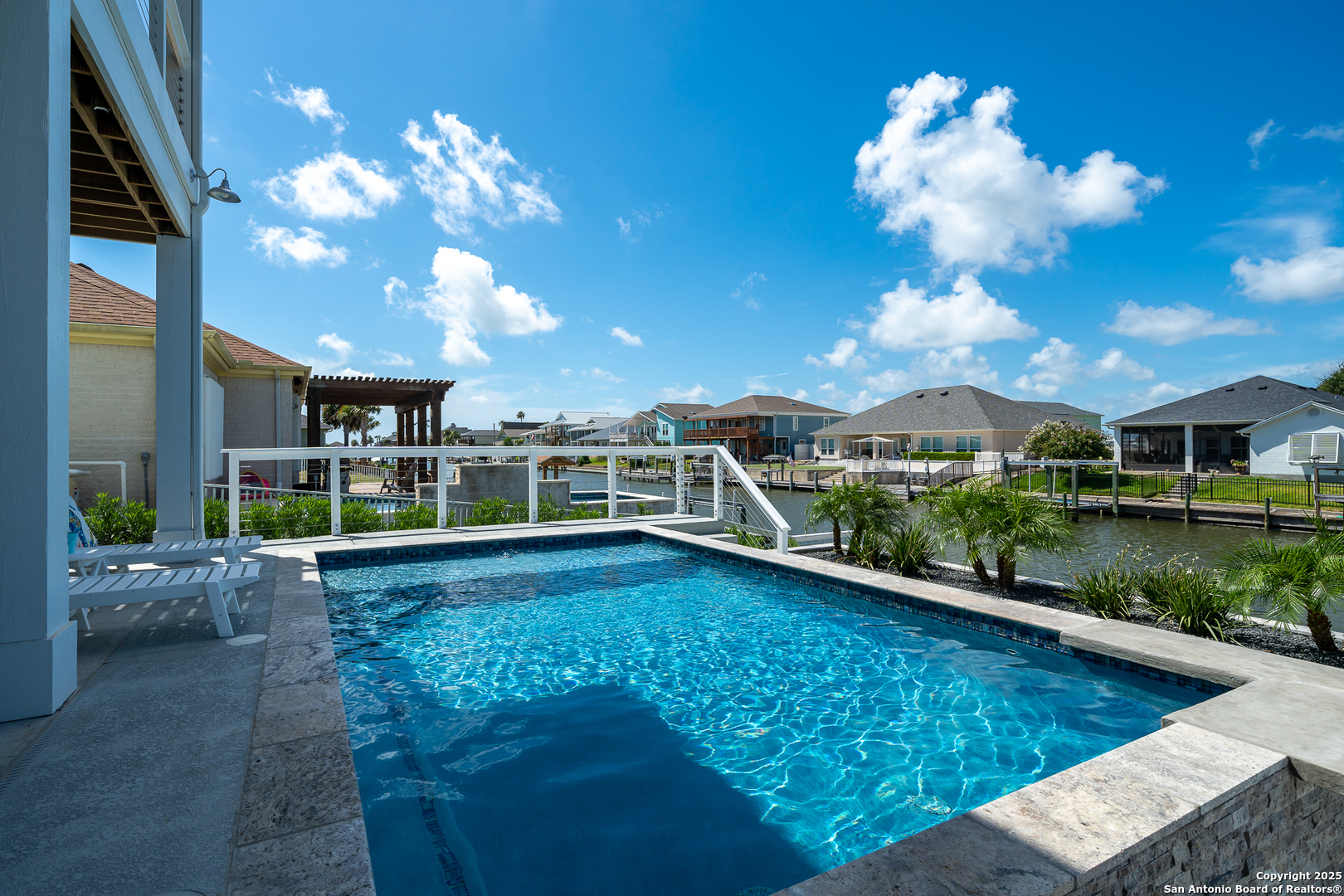 107 Windjammer Road Rockport, TX 78382 - Photo 6 of 52 a view of a house with swimming pool