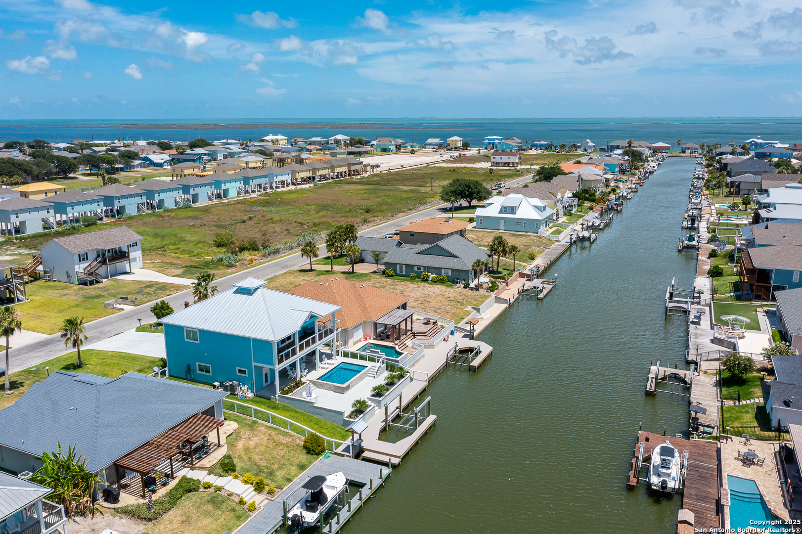 107 Windjammer Road Rockport, TX 78382 - Photo 9 of 52 an aerial view of residential houses with outdoor space