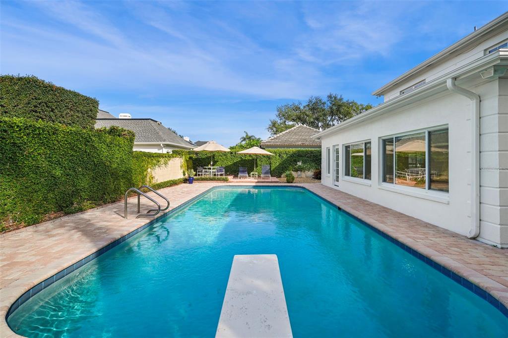4913 Andros Drive Tampa, FL 33629 - Photo 20 of 57 a view of a house with pool