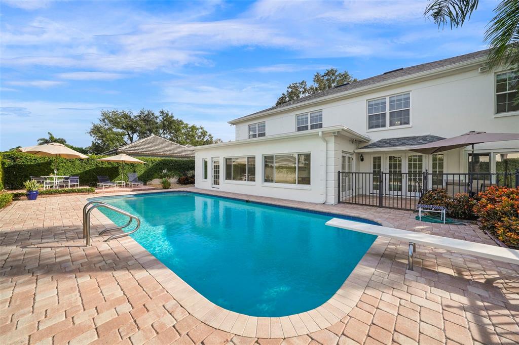 4913 Andros Drive Tampa, FL 33629 - Photo 23 of 57 a view of a house with swimming pool
