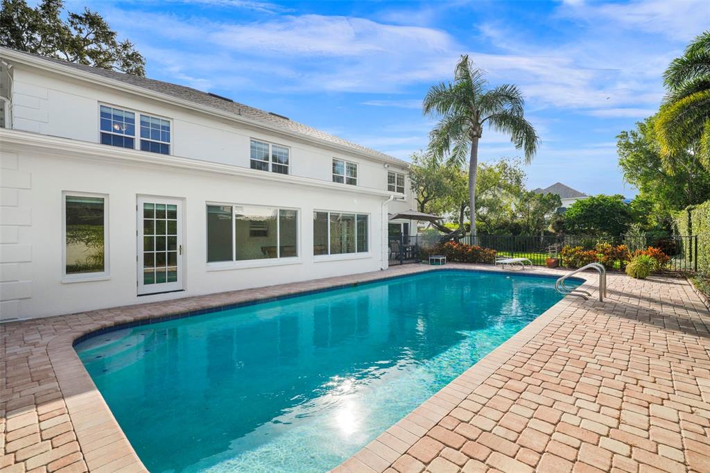 4913 Andros Drive Tampa, FL 33629 - Photo 27 of 57 a view of a house with a swimming pool