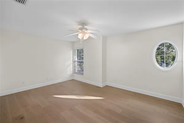 a bathroom with a sink vanity and mirror