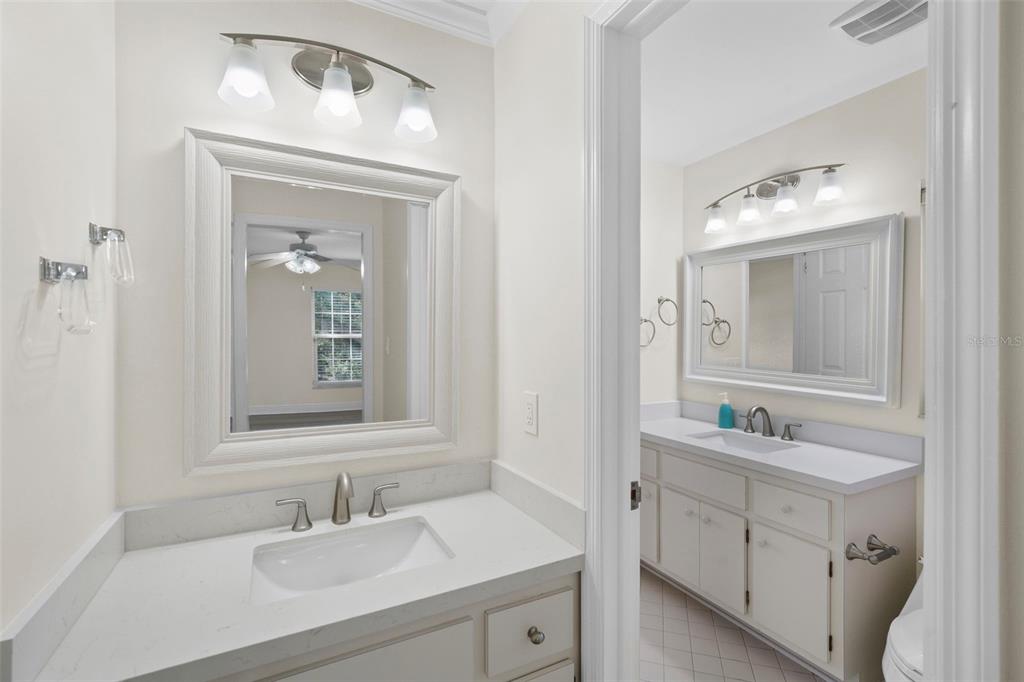 4913 Andros Drive Tampa, FL 33629 - Photo 45 of 57 a bathroom with a sink vanity and mirror