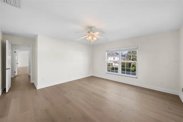 a front view of a house with a lots of yellow lighting