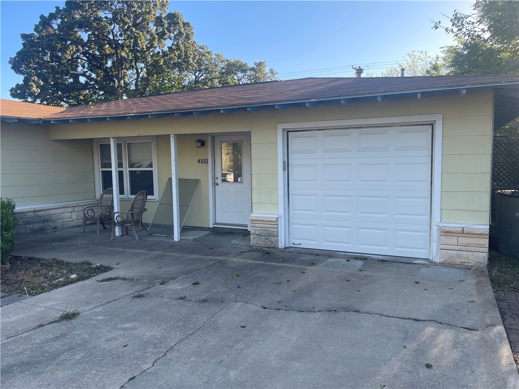 4102 Aspen Street Bryan, TX 77801 - Photo 18 of 19 a view of a house with a space and garage