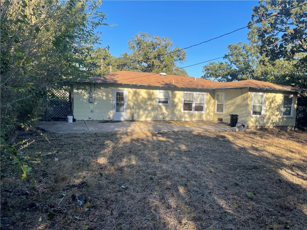4102 Aspen Street Bryan, TX 77801 - Photo 7 of 19 a view of a house with a yard