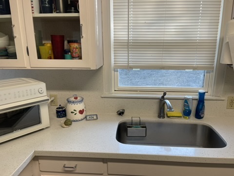 4102 Aspen Street Bryan, TX 77801 - Photo 8 of 19 a kitchen with a sink and a window