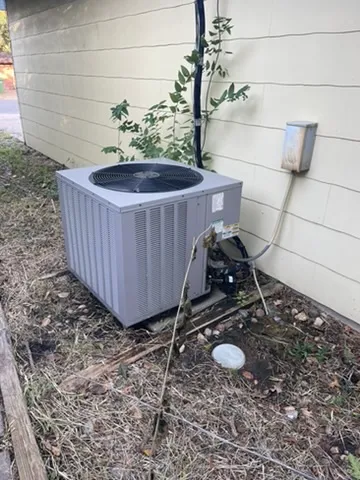 a view of a sink with wooden wall