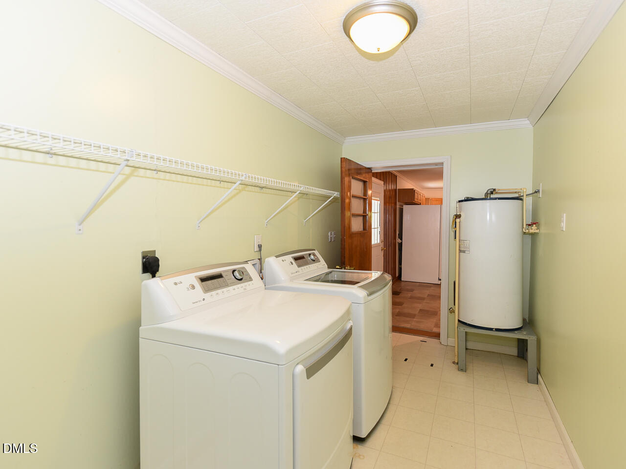 1703 St Patrick Drive Raleigh, NC 27603 - Photo 13 of 29 a utility room with dryer and washer