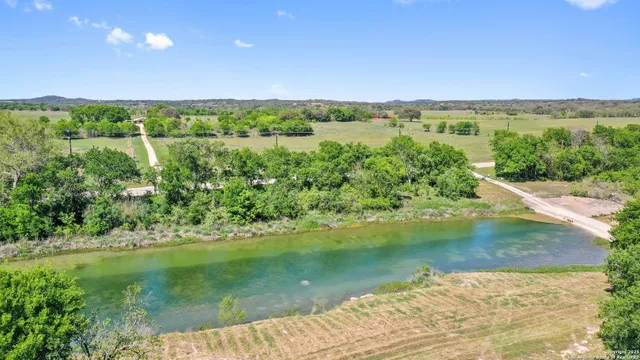 a view of lake with green space