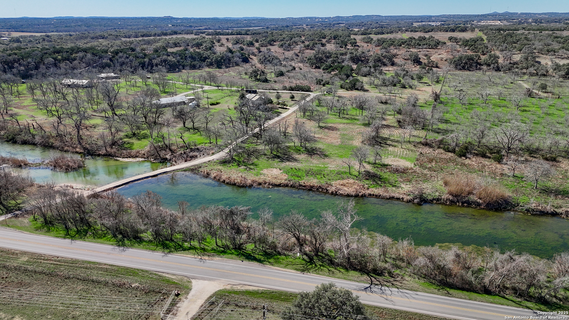 Tbd Lost Acres Loop Blanco, TX 78606 - Photo 4 of 39 an aerial view of a residential houses with outdoor space and trees