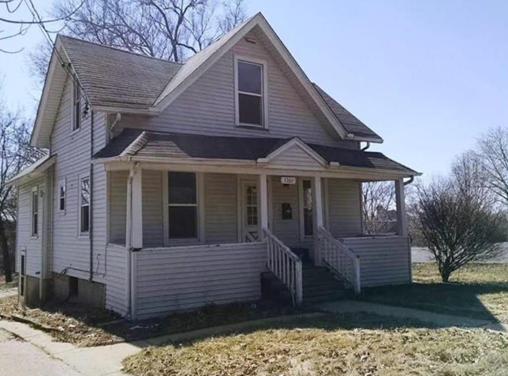 1361 Rural Street Rockford, IL 61107 - Photo 1 of 1 a front view of a house with a yard