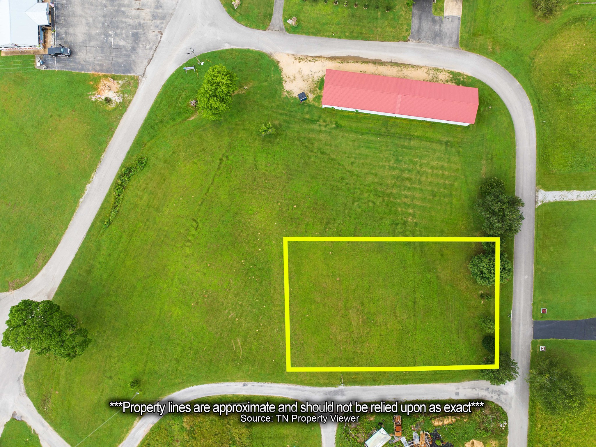 0 Ellen Lane Decaturville, TN 38329 - Photo 2 of 10 a view of a swimming pool with a yard