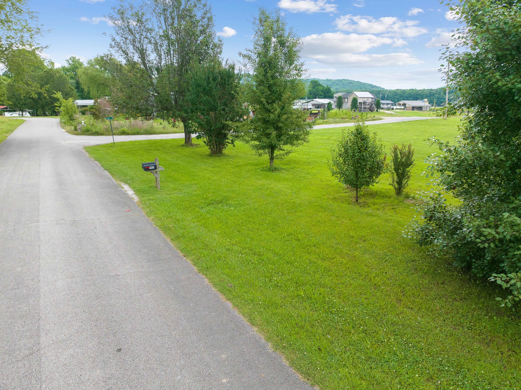 0 Ellen Lane Decaturville, TN 38329 - Photo 10 of 10 a view of a lake with a big yard