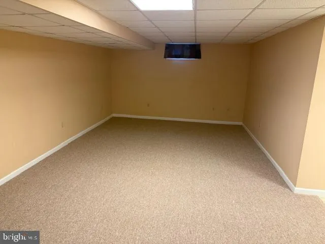 a view of a room with an empty space