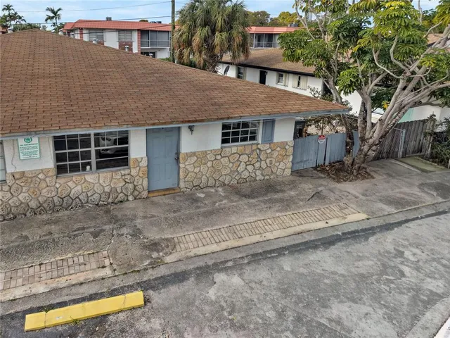 front view of a house with a dry yard