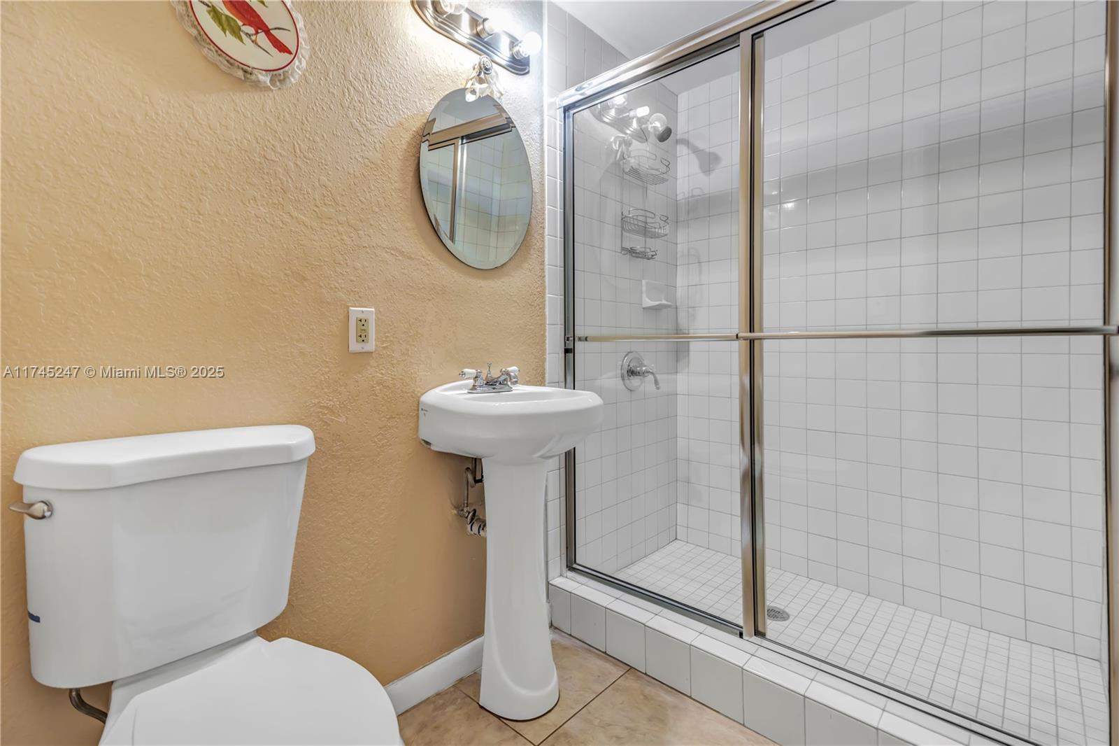 15101 Southwest 27th Street Davie, FL 33331 - Photo 25 of 100 a bathroom with a sink toilet and shower