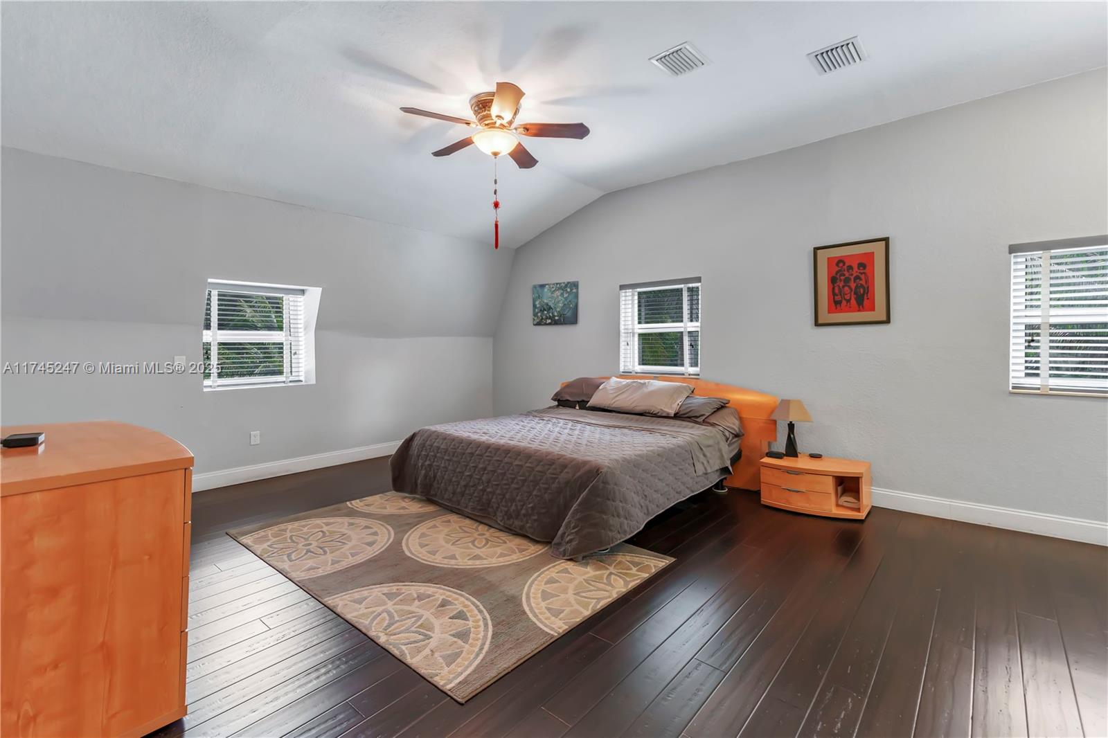 15101 Southwest 27th Street Davie, FL 33331 - Photo 36 of 100 a bedroom with a bed and wooden floor