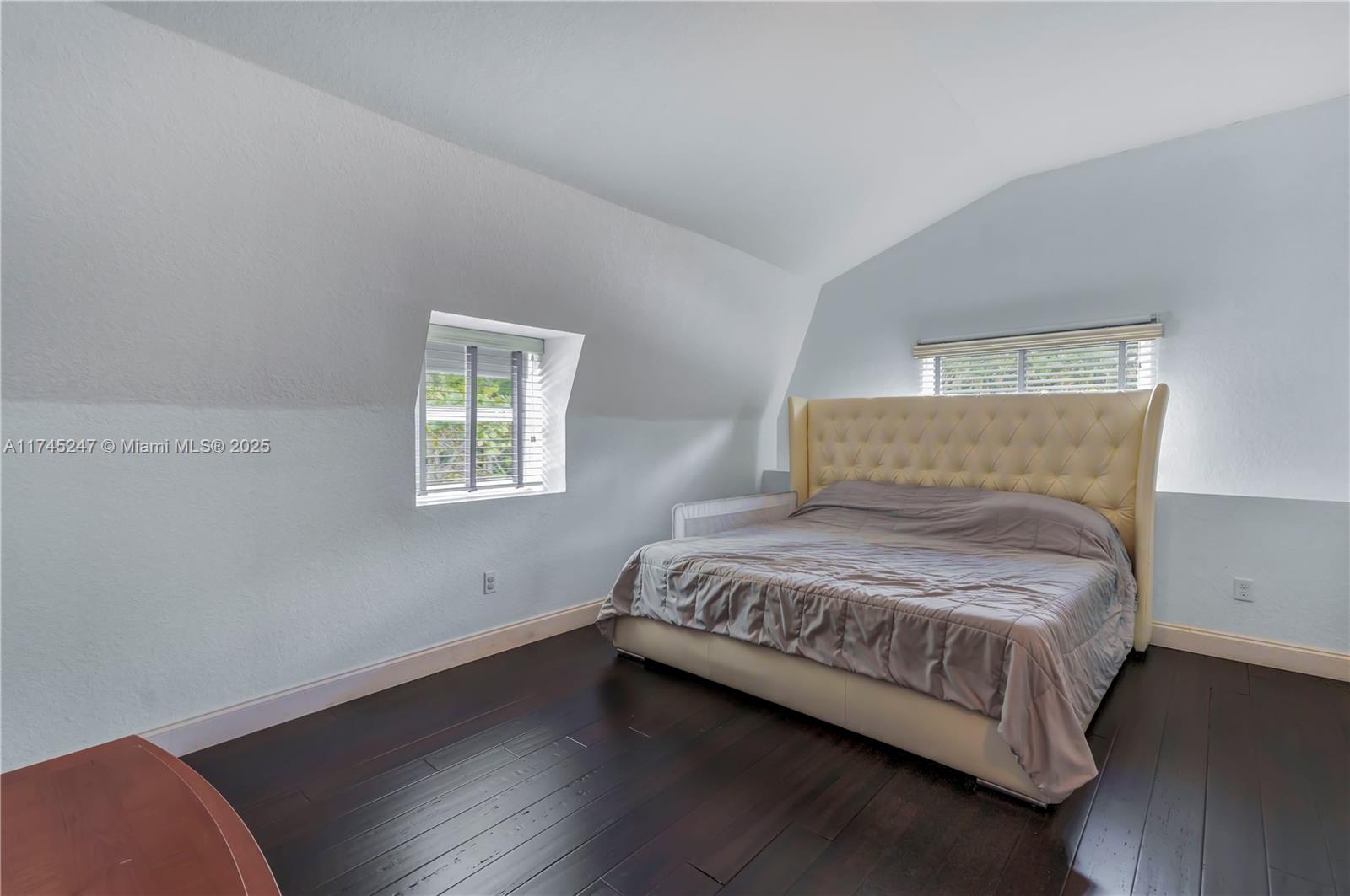 15101 Southwest 27th Street Davie, FL 33331 - Photo 44 of 100 a bedroom with a bed and a window