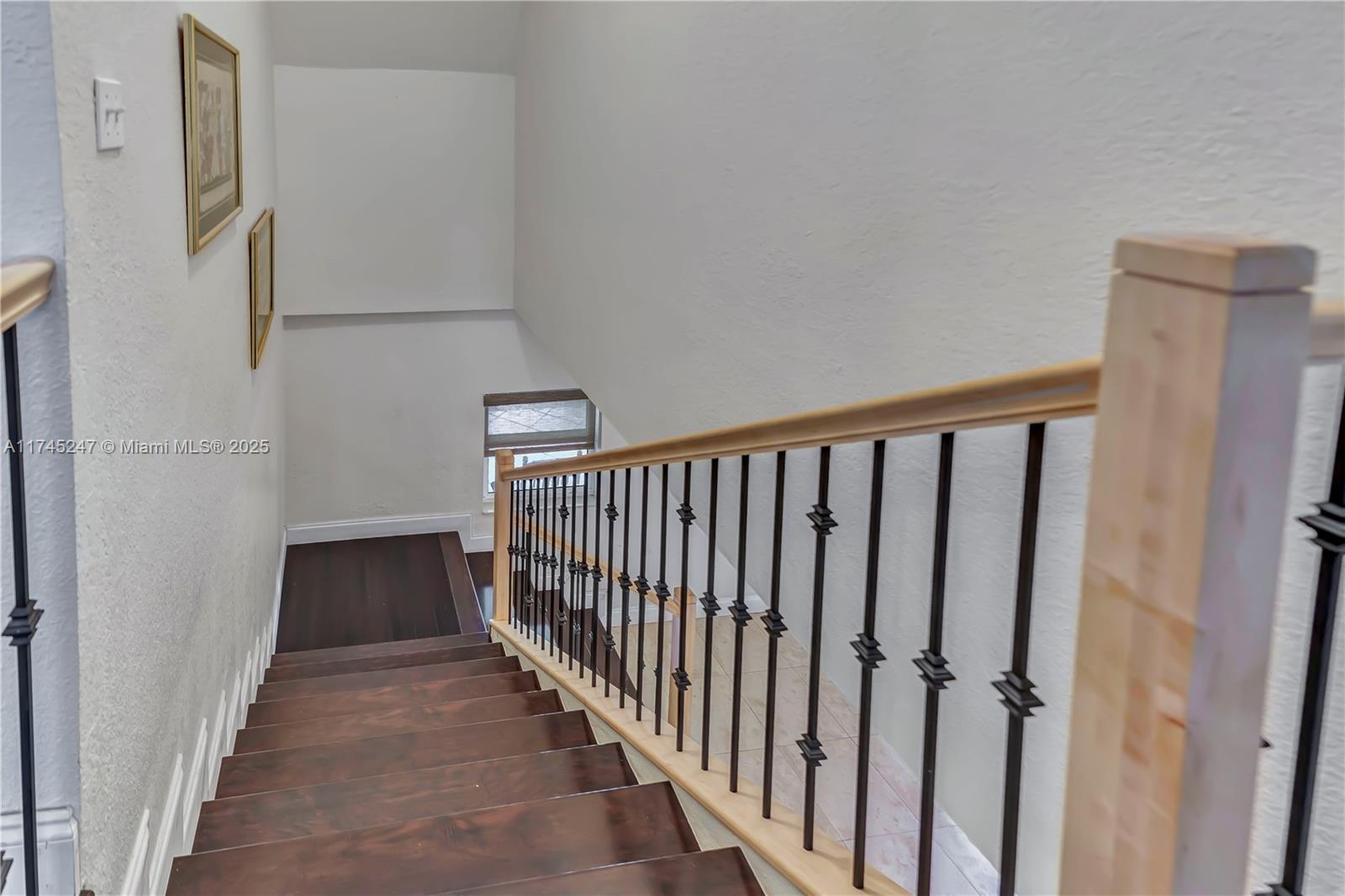 15101 Southwest 27th Street Davie, FL 33331 - Photo 46 of 100 a view of a hallway with wooden floor and staircase