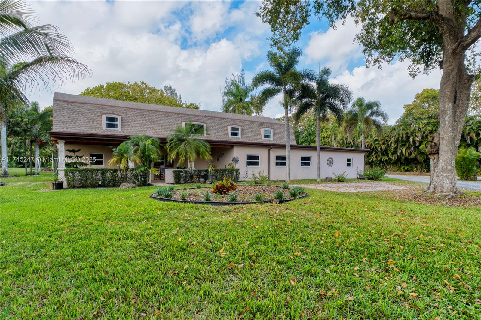 15101 Southwest 27th Street Davie, FL 33331 - Photo 54 of 100 a view of a house with a yard porch and sitting area