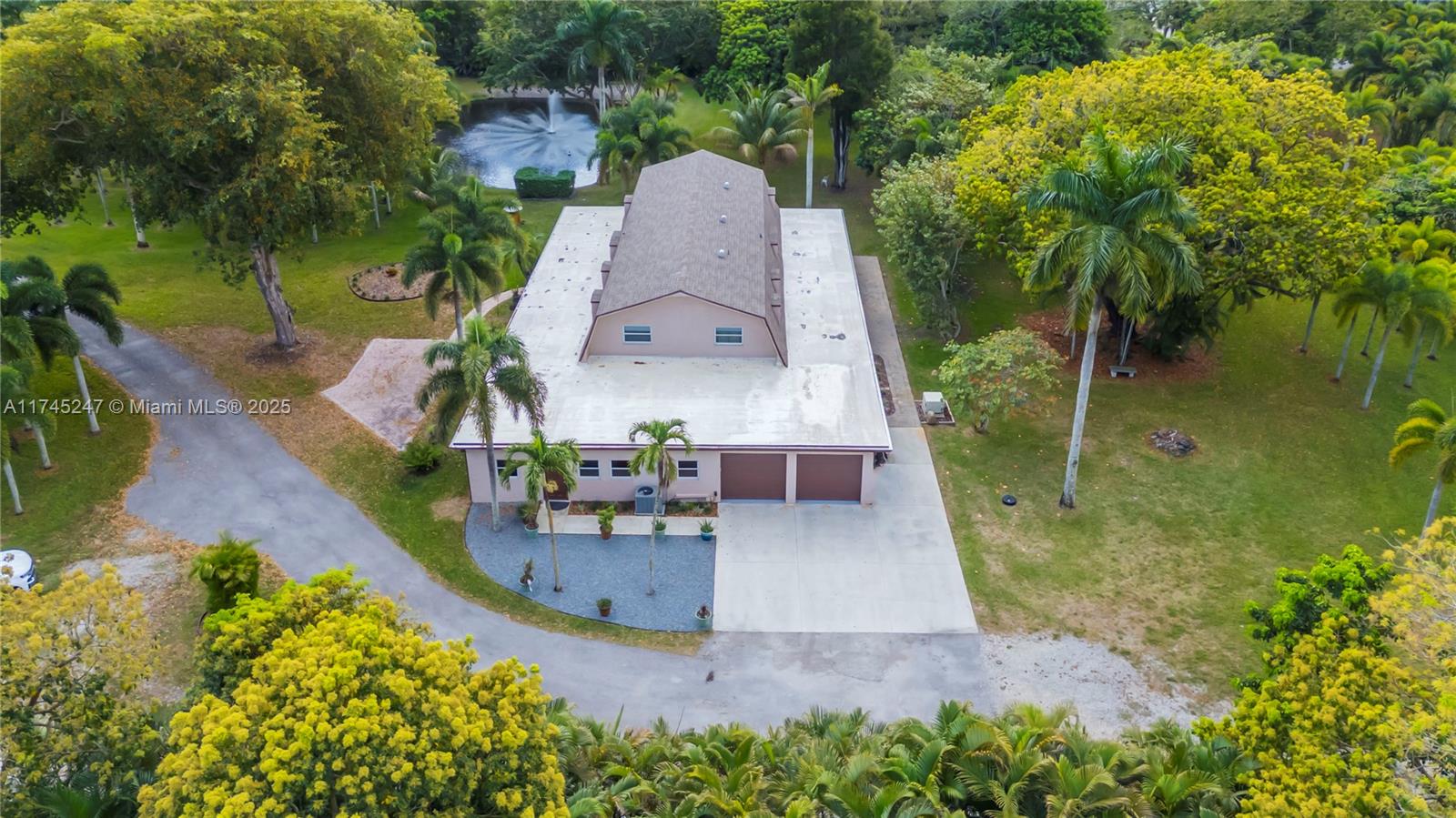 15101 Southwest 27th Street Davie, FL 33331 - Photo 64 of 100 an aerial view of a house with a garden and plants