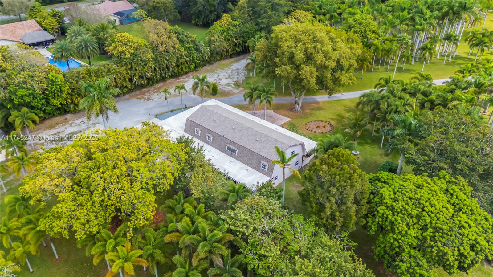 15101 Southwest 27th Street Davie, FL 33331 - Photo 68 of 100 an aerial view of a house with a yard