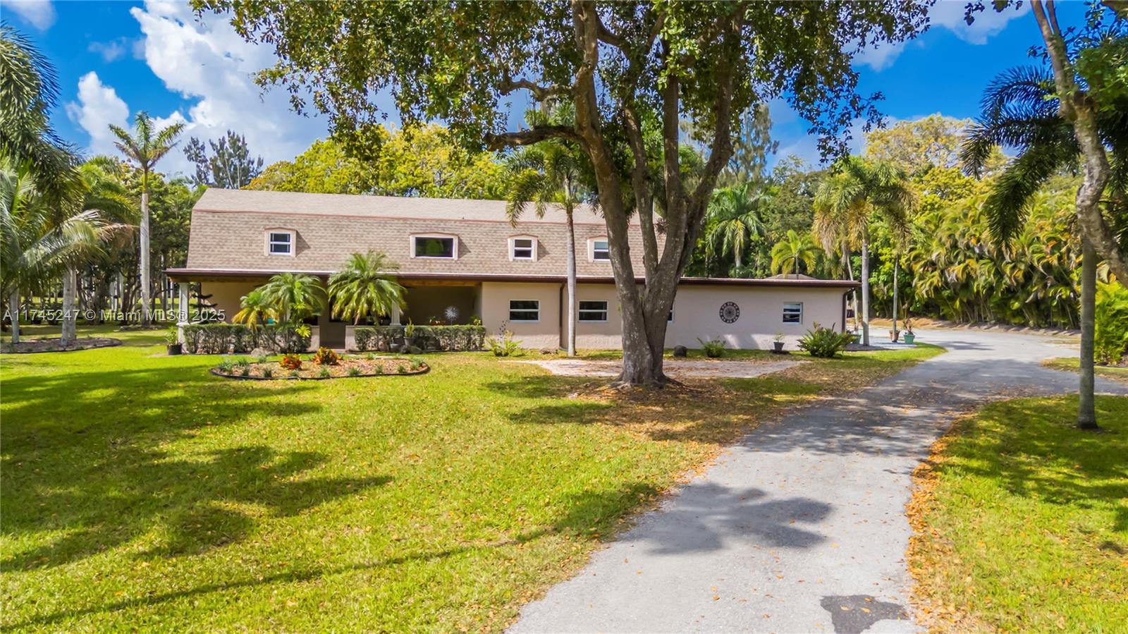15101 Southwest 27th Street Davie, FL 33331 - Photo 72 of 100 a front view of a house with swimming pool