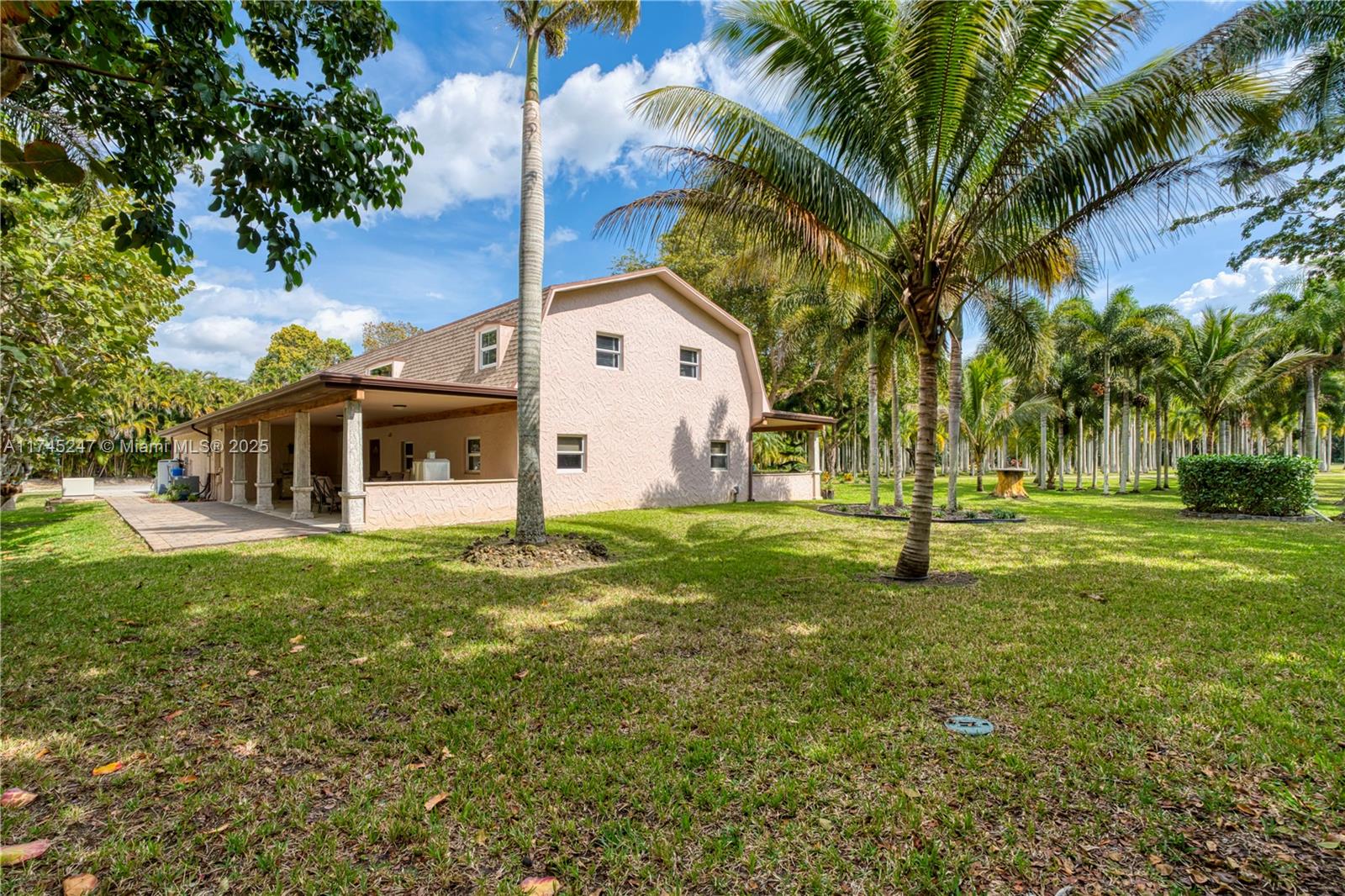 15101 Southwest 27th Street Davie, FL 33331 - Photo 86 of 100 a view of a house with a backyard