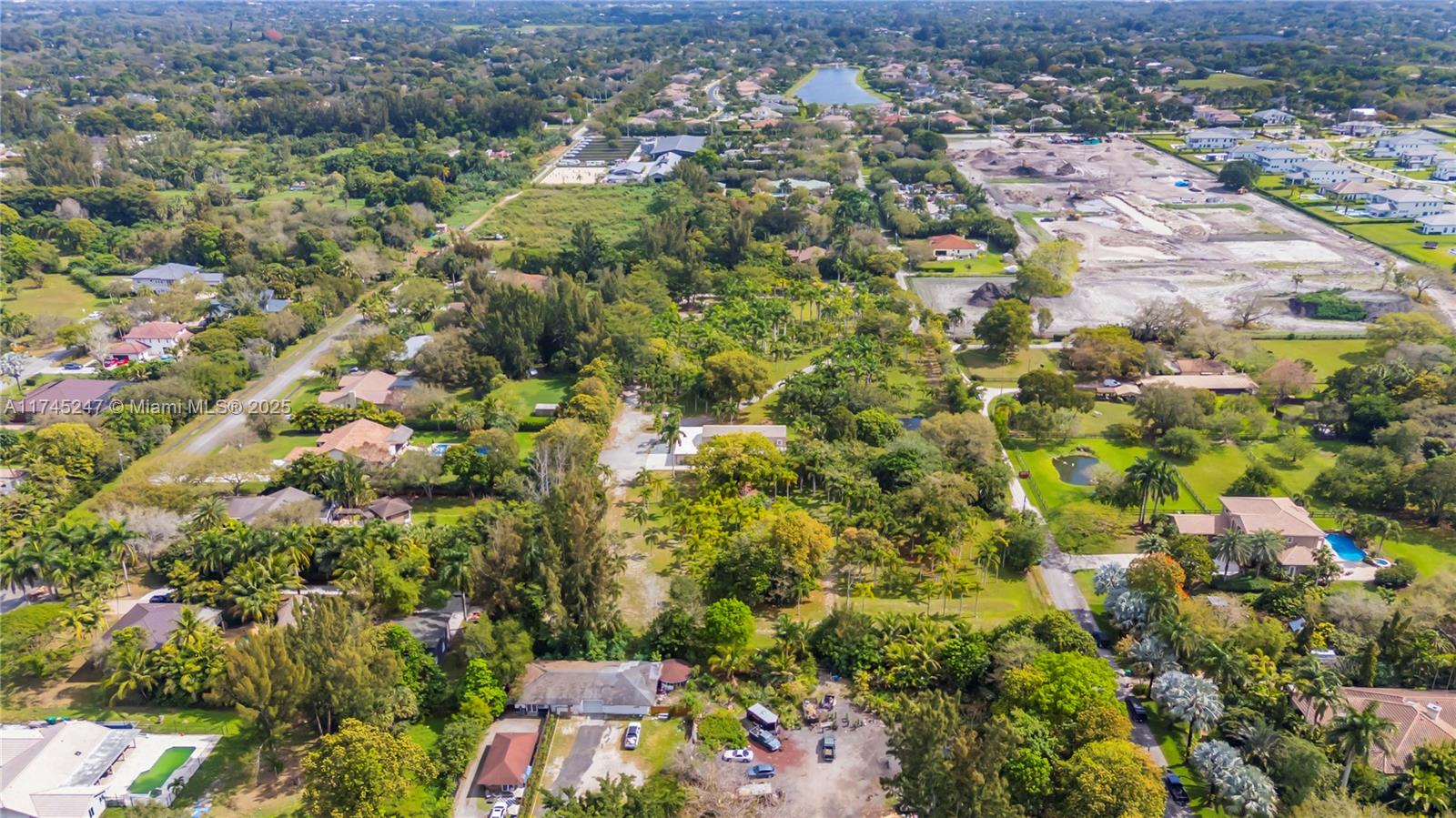 15101 Southwest 27th Street Davie, FL 33331 - Photo 87 of 100 an aerial view of residential houses with outdoor space