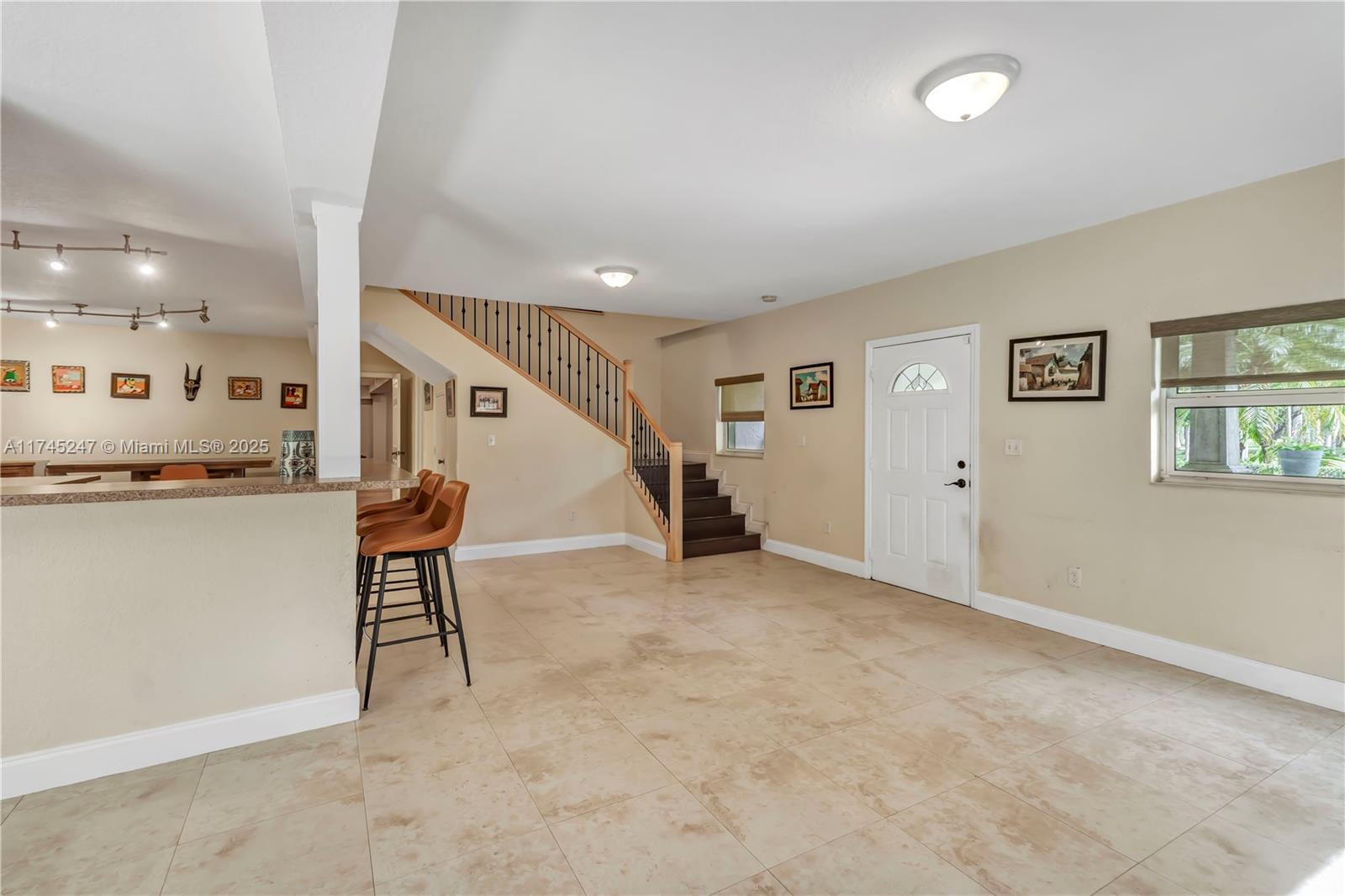 15101 Southwest 27th Street Davie, FL 33331 - Photo 9 of 100 a view of a livingroom with furniture and a window