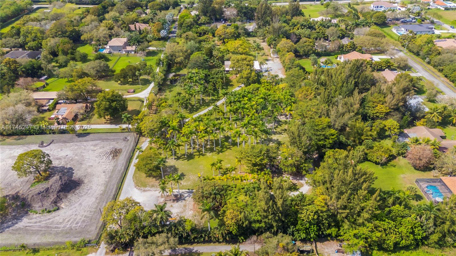 15101 Southwest 27th Street Davie, FL 33331 - Photo 96 of 100 an aerial view of residential houses with outdoor space